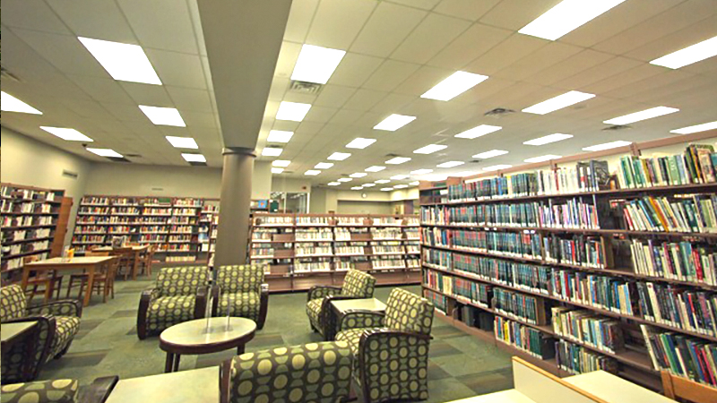 Rogers Public Library Case Study, photograph of library seating area and book shelves